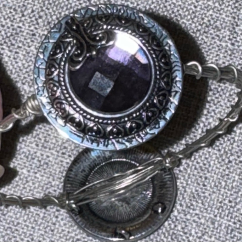Bracelet Featuring 2 Ornate Silver Filigree Setting With Faceted Purple Glass